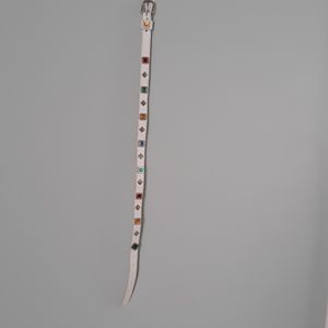 White leather belt with embellishments